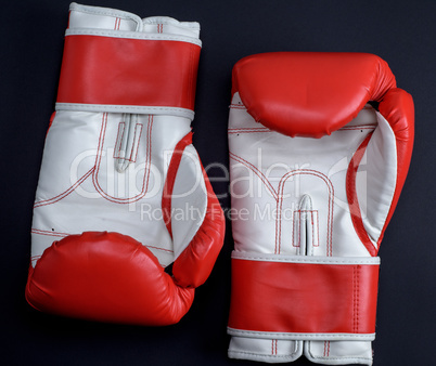 pair of red-white leather boxing gloves