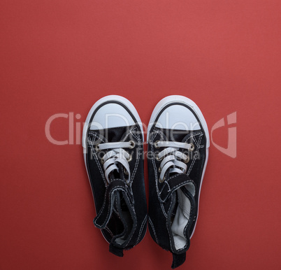 pair of black old textile sneakers