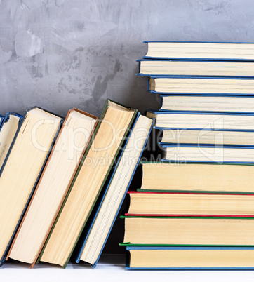 stack of various books on the table