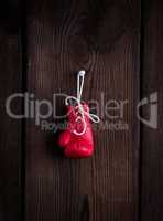 one leather red boxing glove with laces