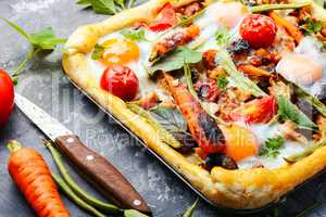 Open savory pie with vegetables