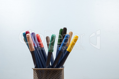 basket with makers pens