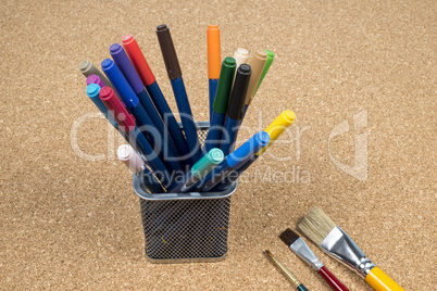 basket with makers pens