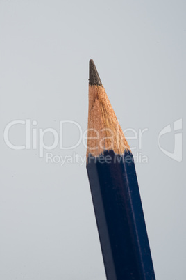 tip detail of black pencils on a little blue background