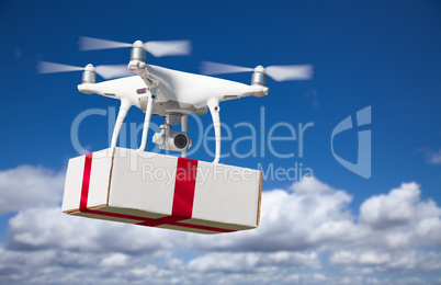 Unmanned Aircraft System (UAV) Quadcopter Drone Delivering Box