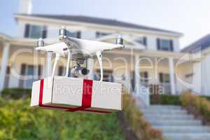 Unmanned Aircraft System (UAV) Quadcopter Drone Delivering Box W