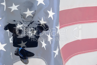 Composite image of overhead view of chest protector with sports helmet and shoes