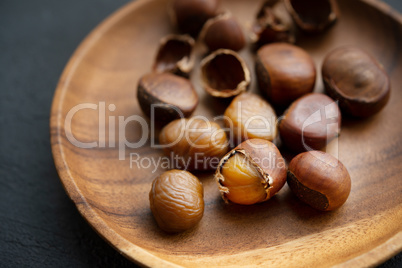 chestnuts on wooden plate