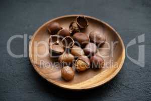 chestnuts on wooden plate