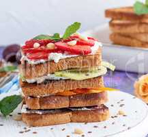 French toast with cottage cheese, strawberries, kiwi and blueber