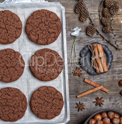 round chocolate cookies on an iron plate