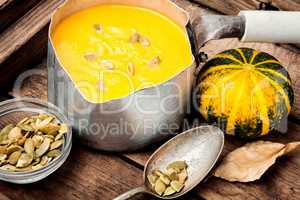 Pumpkin cream soup in bowl
