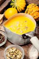 Pumpkin cream soup in bowl