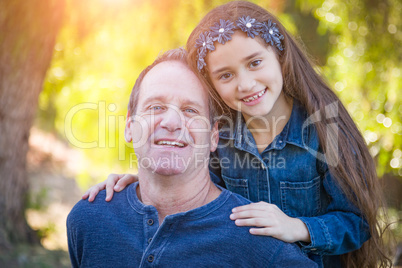 Cute Young Mixed Race Girl And Caucasian Grandfather Having Fun