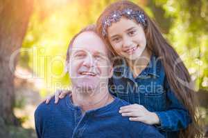 Cute Young Mixed Race Girl And Caucasian Grandfather Having Fun