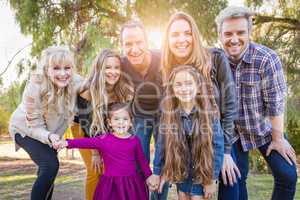 Multigenerational Mixed Race Family Portrait Outdoors