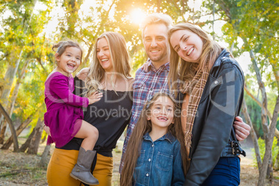 Mixed Race Family Members Having Fun Outdoors