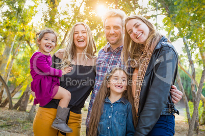 Mixed Race Family Members Having Fun Outdoors