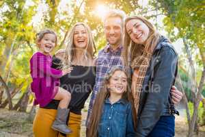 Mixed Race Family Members Having Fun Outdoors