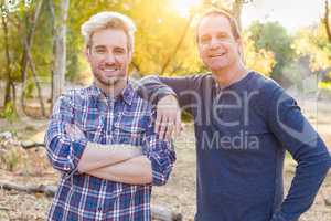 Happy Caucasian Father and Son Portrait Outdoors