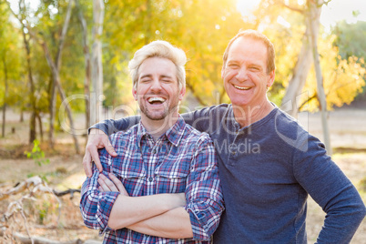 Happy Caucasian Father and Son Portrait Outdoors