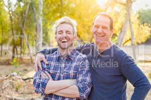 Happy Caucasian Father and Son Portrait Outdoors