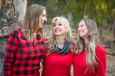 Beautiful Mother and Young Adult Daughters Portrait Outdoors