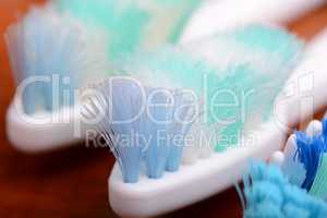 xtreme Macro close up of toothbrush with wooden background