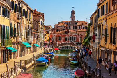 Rio del Magazen in Venice, a channel with pavements and street c