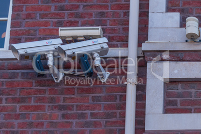 CCTV cameras on the wall of the house