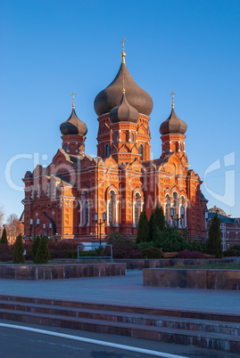 Orthodox assumption Cathedral of red brick. Winter Sunny day, blue sky on the background. Russia, Tula