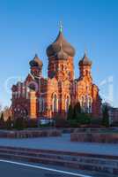 Orthodox assumption Cathedral of red brick. Winter Sunny day, blue sky on the background. Russia, Tula