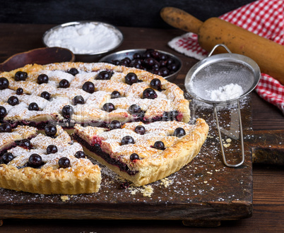 baked round black currant cake