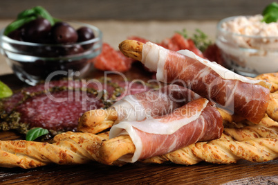 antipasto platter on wooden surface