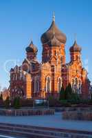 Orthodox assumption Cathedral of red brick. Winter Sunny day, blue sky on the background. Russia, Tula