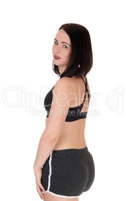 Woman standing from the back in sportswear