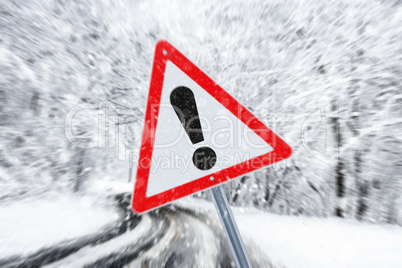 Warning traffic sign on a ice road