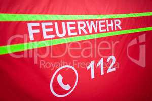 German fire department logo on a tent. The german word Feuerwehr means fire department.