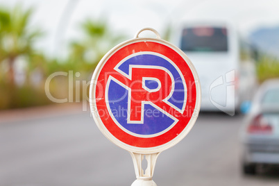 Turkish no parking sign stands on a street