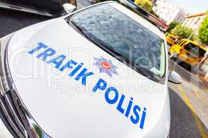 Police car from the turkish police Trafik Polisi stands on a street