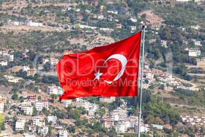 Turkish flag in front of the city of Antalya