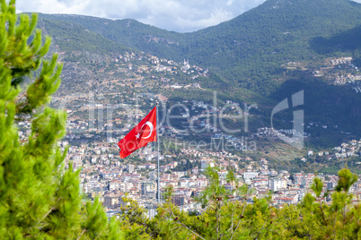 Turkish flag in front of the city of Antalya
