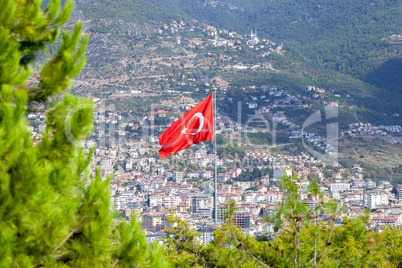 Turkish flag in front of the city of Antalya