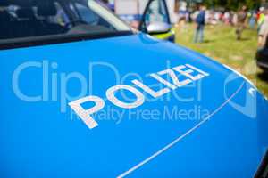 Polizei sign on a german police car. Polizei is the german word for police department.