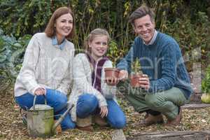 Happy Family Girl Child Father Mother Daughter Gardening