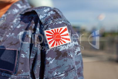 Rising Sun Flag of Japan patch on a soldier uniform