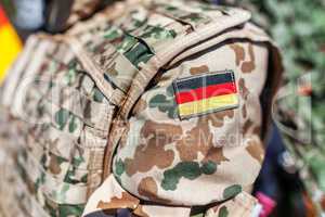 german flag on a german soldier desert uniform