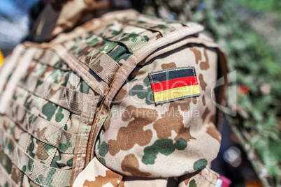 german flag on a german soldier desert uniform
