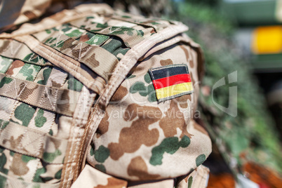 german flag on a german soldier desert uniform