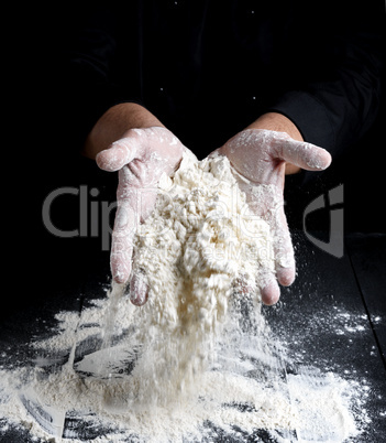 white wheat flour in male hands